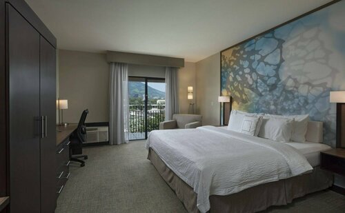 Courtyard by Marriott San Salvador, Забронировать Отель Сан-Сальвадор San Salvador Department