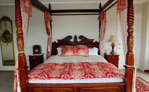 Tudor Manor Bed & Breakfast, Забронировать Отель «постель и завтрак» Парапарауму Kapiti Coast, рядом с Парапарауму-Бич