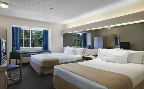 Microtel Inn & Suites by Wyndham Palm Coast I-95, Забронировать Отель Палм-Кост штат Флорида