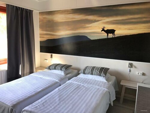 Guesthouse Borealis, Забронировать Отель «постель и завтрак» Отели Рованиеми с парковкой, Парковка