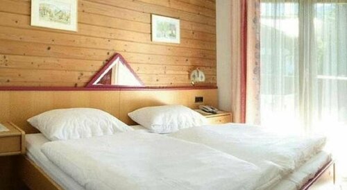 Wellness Pension Hollaus, Забронировать Отель Кирхберг-ин-Тироль Brixental, рядом с Гондольный подъемник Майерльбан (нижняя станция)