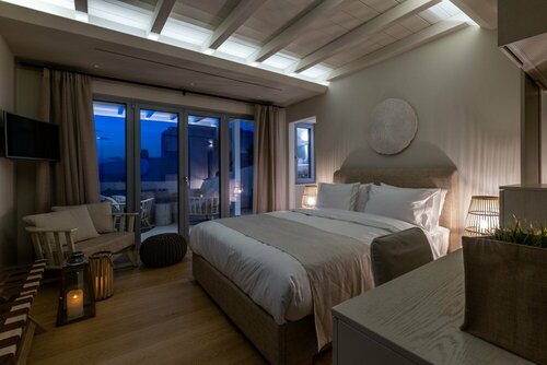Oniro Suites, a member of Mykonos Highlights, Забронировать Отель Миконос остров Миконос, рядом с Panagia Paraportiani Church