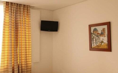 Hotel Zenite, Забронировать Отель Ангра-ду-Эроишму Терсейра
