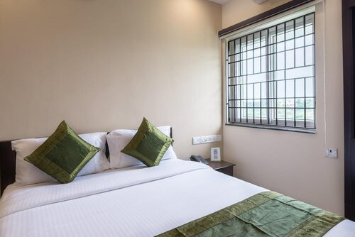 Treebo Adin Residence Chennai Trade Centre, Забронировать Отель Нандамбакам Ченнаи