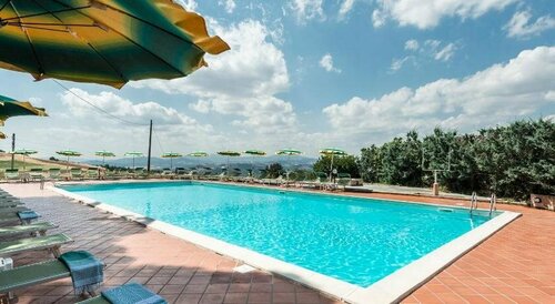 Hotel Cavallino Blu, Забронировать Отель Отели в центре Вольтерра, в центре, Парковка