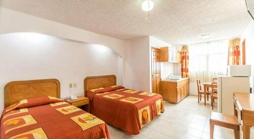 Suites Poliforum Inn, Забронировать Отель Отели Леона с парковкой, рядом с Trade Center CEFEL, Парковка