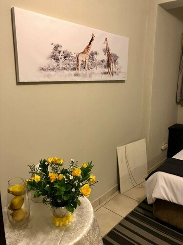 Dossa Guest House, Забронировать Гостевой дом Сэндтон Рандбург