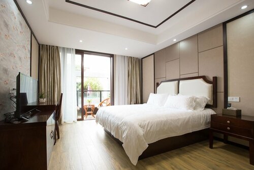 Wuzhen Wangfu Resort Villa, Забронировать Курортный отель Отели Учжэнь с завтраком, Завтраки