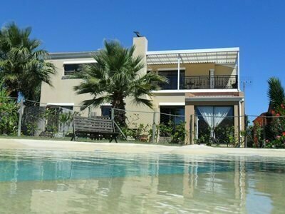 Afro Chic Guest House, Reservar Casa de hóspedes Parklands Table Bay