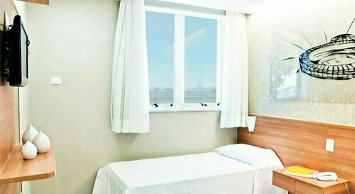 Hotel Caracas Rio, Забронировать Отель Остров Губернатора Рио-де-Жанейро