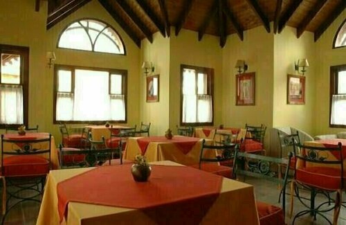 Hotel Campanilla, Забронировать Отель Отели Ушуайя с завтраком, Завтраки