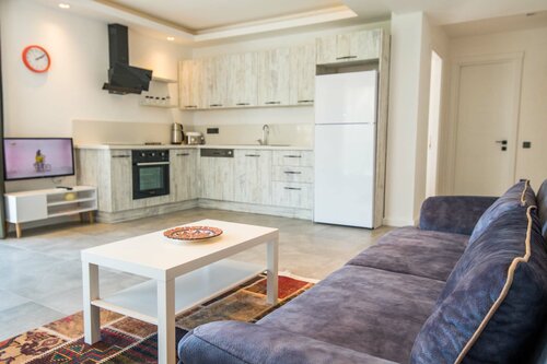 KAYA APARTMENTS, Забронировать Апартаменты/квартира Калкан провинция Анталья