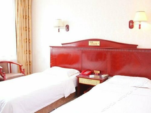 Ziyi Hotel, Prenota Hotel Qingyang Gansu