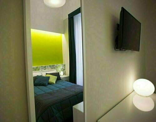 Rettifilo 201 Exclusive Rooms, Забронировать Отель Моло Беверелло Неаполь, рядом с Ospedale degli Incurabili