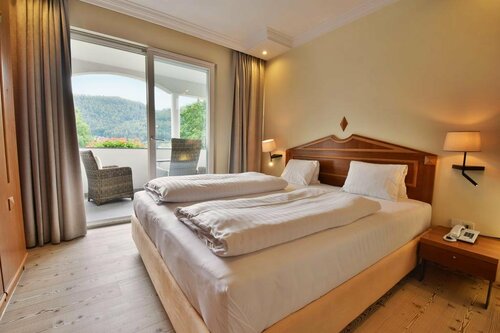 Amerika-Holzer Hotel & Resort, Забронировать Курортный отель Санкт-Канциан Фёлькермаркт