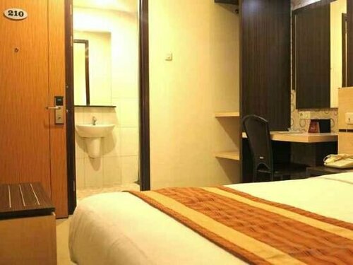 Jolin Hotel, Rezervați Hotel Hoteluri în Sulawesi cu parcare, Parcare