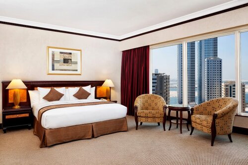 Corniche Hotel Sharjah, Забронировать Отель Отели Эмирата Шарджи 5 звезд, 5*