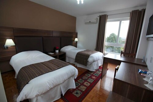 Hotel Obino Bagé, Забронировать Отель Отели Баже с парковкой, Парковка