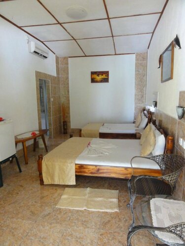 Rising Sun Guesthouse, Забронировать Гостевой дом Ла-Диг Сейшельские острова