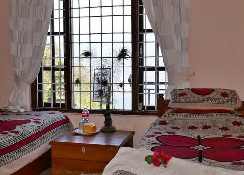 Peace Dragon Lodge, Забронировать Отель Недорогие отели провинции Гандаки-Прадеш, недорого