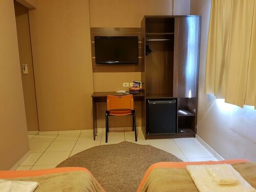 Astro Hotel, Забронировать Отель Отели в центре Сан-Жозе-дус-Кампуса с завтраком, отели в центре Сан-Жозе-дус-Кампуса с завтраком
