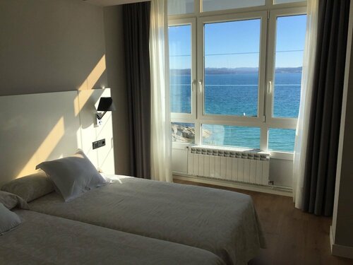 Hotel La Cruz, Забронировать Отель Мухия Camino dos Faros