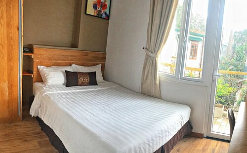 Cozy Boutique Hotel, Забронировать Отель Далат Ламдонг, рядом с Гостевой дом Ханг Нга