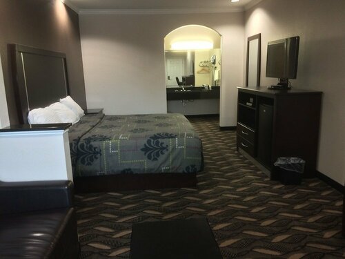 Palace Inn Sam Houston Race Park, Забронировать Отель Хьюстон 