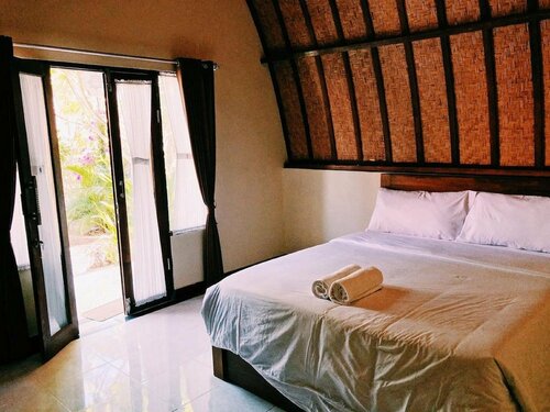 Ratu Cottage by OurStory Travels, Забронировать Дом для отпуска Недорогие отели провинции Бали, недорогие