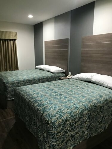 Grand Villa Inn & Suites - Humble, Book Villa Humble Texas Gulf Coast