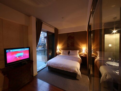 China Community Art Habitat Hotel, Prenota Hotel Hotel a Shandong con parcheggio, Parcheggio