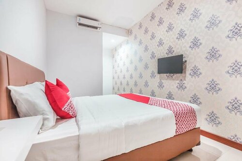 OYO 1555 Unik Guesthouse Syariah, Reservar Hotel Hotéis em Cilandak com Estacionamento, Estacionamento