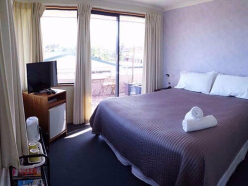 Boatshed Motel Apartments, Забронировать Мотель Маунт-Маунгани регион Бей-оф-Пленти