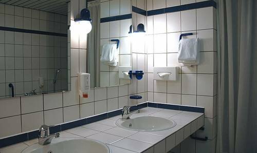 Hotel am Stadtpark, Забронировать Отель Хильден Северный Рейн-Вестфалия