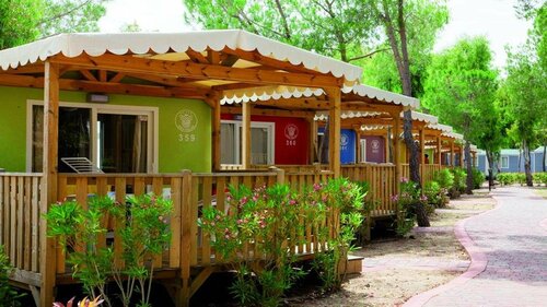 Centro Vacanze Isuledda - Camping Village, Забронировать Отель Арцакена Изумрудный берег