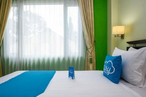 Truntum Padang Hotel, Забронировать Отель Отели Паданг с бассейном, Бассейн