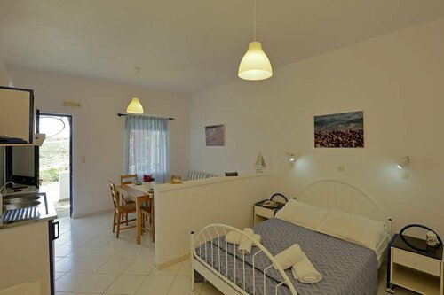 Spanos Apartments - Andros, Забронировать Апартаменты/квартира Айос-Петрос Андрос