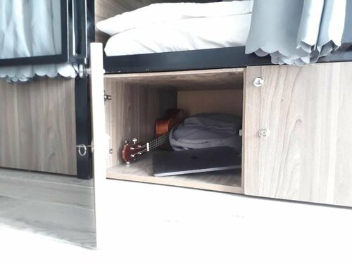 Dorm bed in center with balcony, rooftop and floating market tour, Buchen Sie Hostel Hotels in Mekongdelta mit Parkplatz, Parkplätze