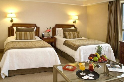 Hotel Regal Pacific Santiago, Забронировать Отель Лас-Кондес Сантьяго