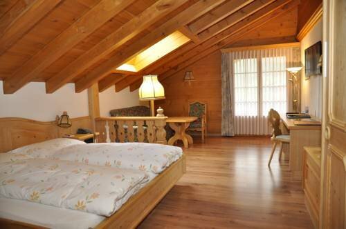 Hotel Alpenland, Забронировать Отель Лауэнен 