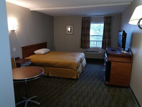 Peachtree Inn & suites, Забронировать Отель Доравилл Джорджия