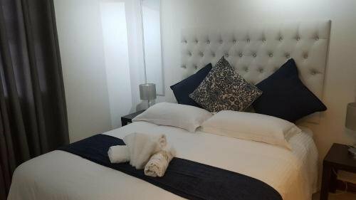 The Grand Orchid Guesthouse, Забронировать Гостевой дом Отели Дурбана с парковкой, Парковка