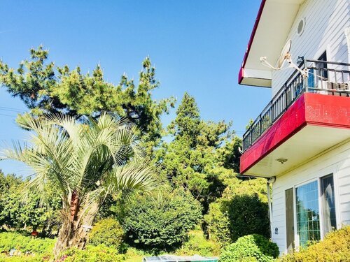 Jeju Red Roof Pension, Забронировать Отель Отели Согвипхо с парковкой, Парковка
