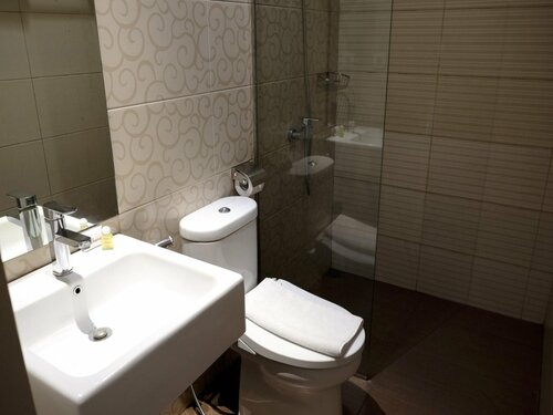 De'Corner Guest House, Prenota Affittacamere Hotel a Malang con parcheggio, vicino a Malang Library, Parcheggio