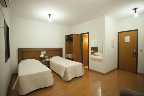 Indaiá Hotel Residence, Забронировать Отель Отели в центре Сан-Карлус, в центре