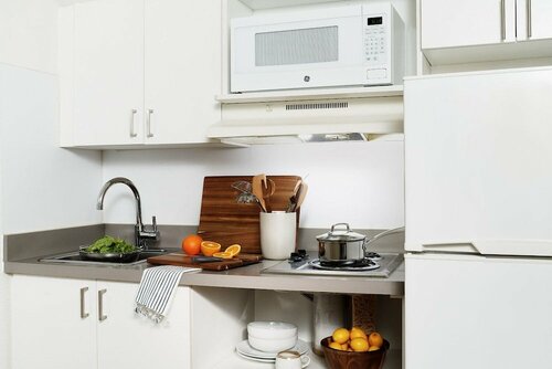 InTown Suites Extended Stay Albuquerque NM, Забронировать Отель Отели Нью-Мексико с парковкой, Парковка