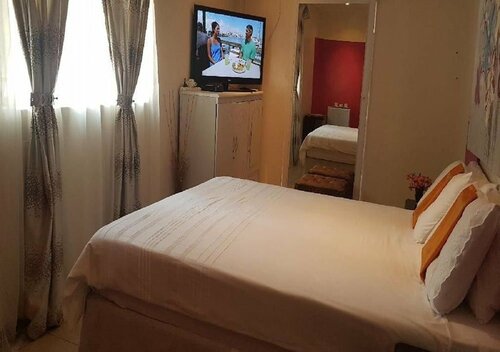 Amogelang Guest House, Boek Pension Kasane Chobe, in de buurt van Mowana Golf Course