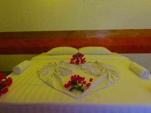 Ramoli Guest Inn Rasdhoo, Забронировать Гостевой дом Атолл Алиф-Алиф Мальдивы