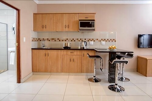 The Cycad Lodge, Забронировать Отель Отели Мпумаланга с парковкой, Парковка