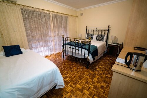 Dolliwarie Guesthouse, Забронировать Гостевой дом Кейптаун Центр Кейптаун